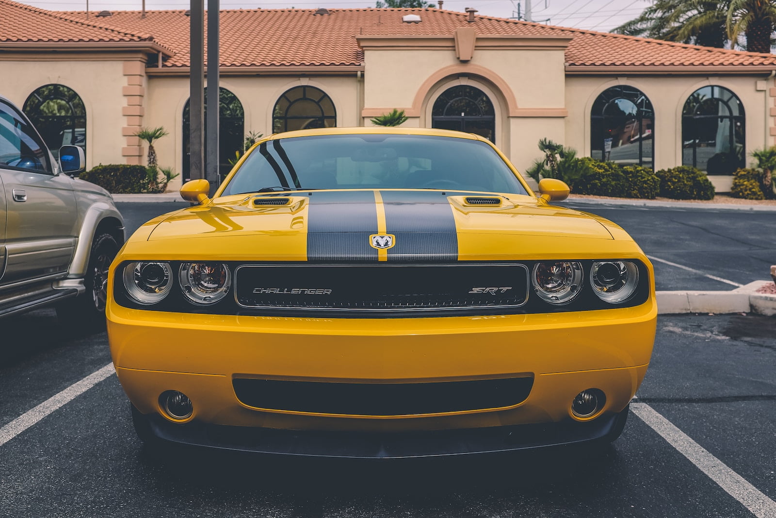 yellow Dodge Challenger coupe